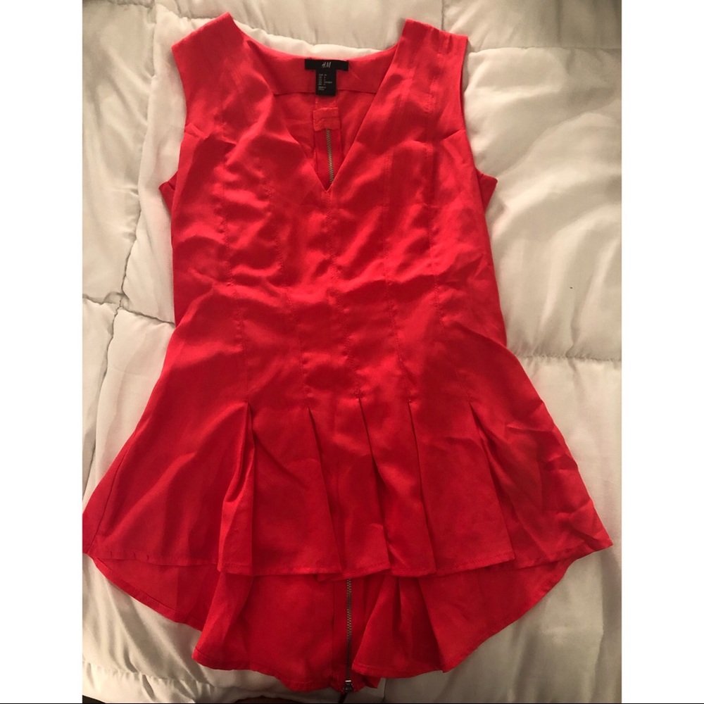 Peplum blouse/shirt it’s more a subtle neon pink